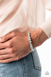 Paparazzi Accessories - BLING Them To Their Knees - White Rhinestone Bracelet - Travona's Dazzling Jewels