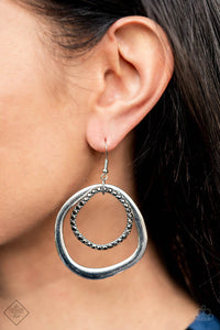 Paparazzi - Spinning With Sass - Silver Earrings